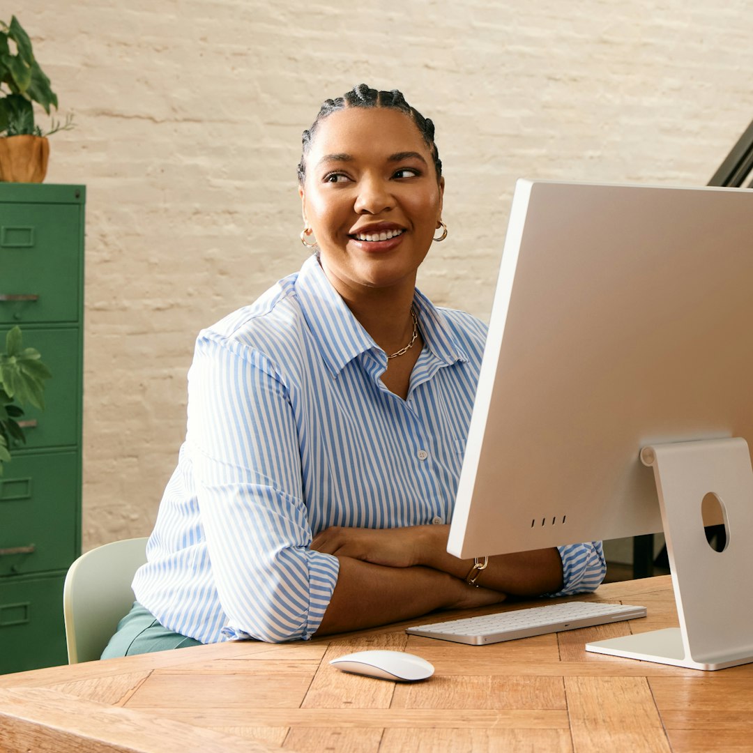 Mint Circuit founder working in creative studio space